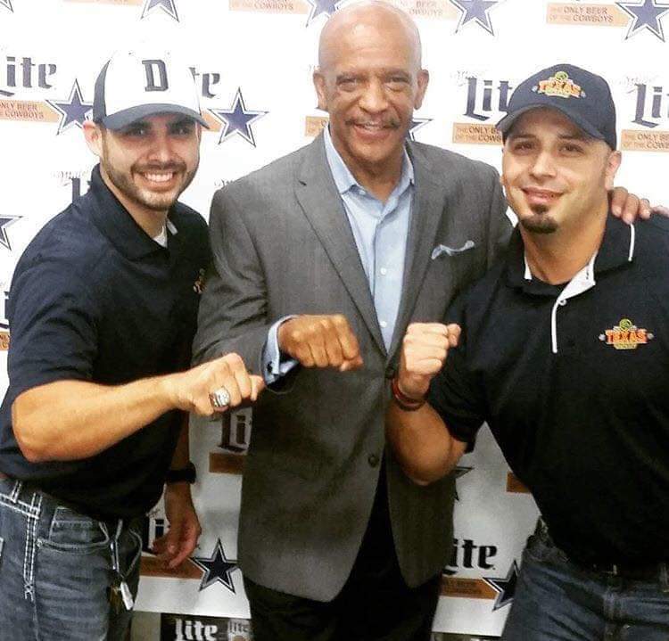 A coworker, Drew Pearson, and myself at a company event.